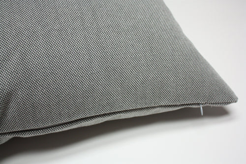 Gray textured pillow on a white background