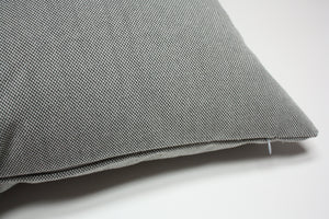 Gray textured pillow on a white background