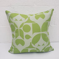 Green patterned pillow on a white background