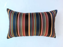 Load image into Gallery viewer, Striped pillow with multicolor pattern on a light blue background