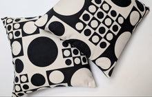 Load image into Gallery viewer, Two black and white patterned pillows on a light gray background