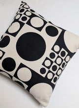 Load image into Gallery viewer, Decorative pillow with black and white circle pattern on a light background
