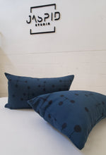 Load image into Gallery viewer, Blue pillows with black polka dots on a white surface, with 'JASPRID' branding.
