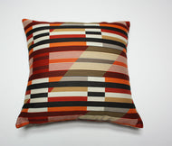 Decorative pillow with geometric pattern on a white background