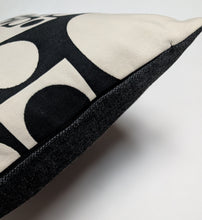 Load image into Gallery viewer, Close-up of a cushion with geometric pattern on a white background