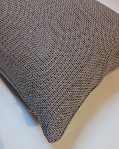 Gray textured pillow on a white background